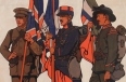 [British, French, and American soldier holding flags]